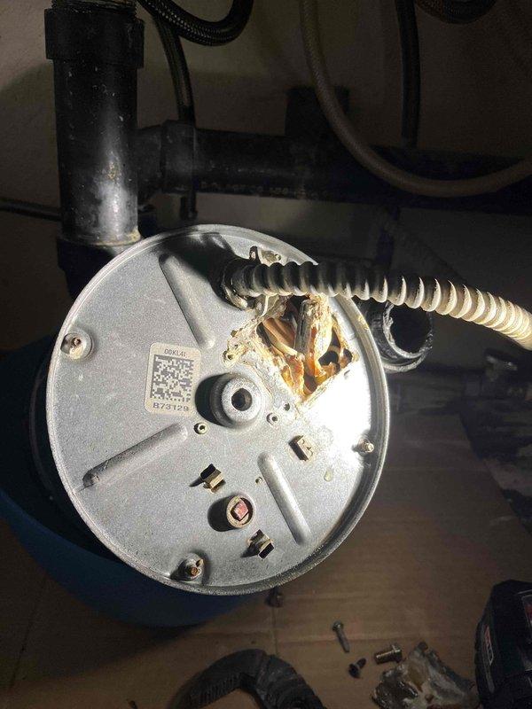 Responded to kitchen garbage disposal failure with reported leaking, grinding issues, and smoking before complete operational failure. Upon inspection, found disposal unit showed signs of significant wear, corrosion, and internal damage consistent with age and deterioration. Documented existing conditions including damaged motor housing and evidence of electrical failure. Evaluated disposal system and provided recommendations for replacement due to safety concerns and extent of component damage.