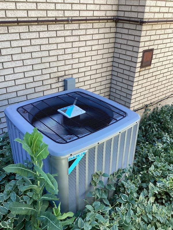 Completed annual preventive maintenance on 6-year-old Daikin outdoor condensing unit as part of Green Shield Cooling Maintenance membership program. Performed comprehensive system inspection including electrical connections, capacitor testing, and CoreSense monitoring device verification. All components operating within normal parameters with no issues reported by member at time of service.