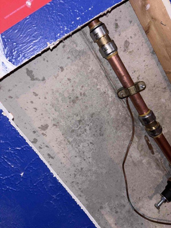 Responded to a water pressure issue following recent pressure reducing valve replacement. Upon arrival, inspected the newly installed PRV and approximately 6 inches of copper piping that had been replaced due to a leak above the original valve. Diagnosed inadequate water pressure throughout the residence. Evaluated PRV settings, brass fittings, and copper pipe connections to identify the cause of pressure loss. Adjusted pressure reducing valve to restore proper water pressure to the 28-year-old home's plumbing system.