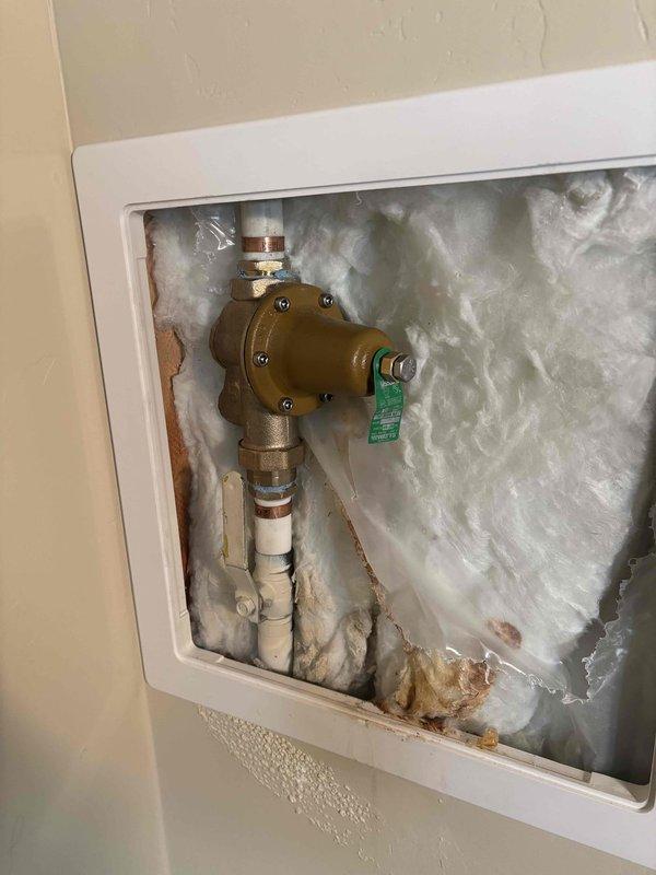Successfully installed a new Rheem 50-gallon Ultra Low NOx water heater with complete code-compliant accessories including 4-inch universal adapter, draft hood connector, ball valve, water flex lines, expansion tank, earthquake straps, gas flex line, gas stop, and sediment trap. Water heater pan was installed and piped to floor drain, and a new 1-inch PRV was installed in the wall access panel with pressure set to specification. All connections were tested and verified leak-free, and the old water heater was removed and hauled away from the premises.