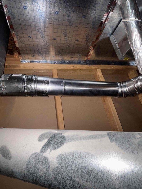 Successfully installed a new Rheem 50-gallon Ultra Low NOx water heater with complete code-compliant accessories including 4-inch universal adapter, draft hood connector, ball valve, water flex lines, expansion tank, earthquake straps, gas flex line, gas stop, and sediment trap. Water heater pan was installed and piped to floor drain, and a new 1-inch PRV was installed in the wall access panel with pressure set to specification. All connections were tested and verified leak-free, and the old water heater was removed and hauled away from the premises.