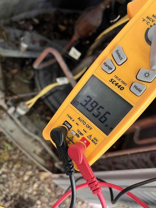 Completed comprehensive cooling maintenance on 19-year-old residential AC system. Performed full system diagnostics including temperature and pressure readings across refrigerant lines, with multimeter confirming proper operational parameters. Conducted internal duct inspection using digital borescope camera to assess airflow pathways and verify system cleanliness. Cleaned outdoor condenser coil to optimize heat exchange efficiency. Inspected humidifier pad condition and evaluated air filter status. Verified no ice buildup on evaporator coil and confirmed adequate airflow throughout system. Compared current system conditions against previous service documentation, particularly monitoring previously identified water leak areas. System operating within normal parameters with no immediate concerns identified.