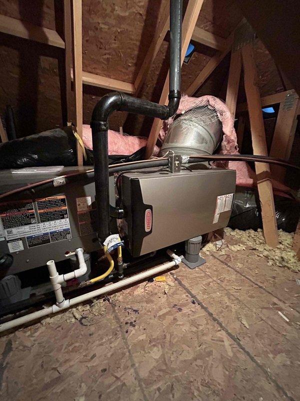 Completed full HVAC system replacement in attic space, installing Lennox EL297UH070XV36BK 90% efficiency furnace, EL18KSLV-036 air conditioner with 3-ton capacity, and CK40HT-36B-71 evaporator coil. Installed S40 programmable thermostat with outdoor sensor for optimal system control and efficiency monitoring.

Configured condensate drainage system with PVC piping routed to existing floor drain. Installed 16x25x5 filter cabinet with MERV 11 filter for improved air quality. Added pressure switch (14A48) and 6-inch pump riser components from inventory to ensure proper furnace operation and condensate removal.

Flushed and reused existing refrigerant lineset, ensuring system integrity and proper refrigerant flow. Installed new AC pad (EL2448-3) for outdoor condensing unit placement. Connected all ductwork to air handler unit with proper sealing and support. Completed all electrical connections including thermostat wiring and outdoor sensor integration.

System was pressure tested, evacuate