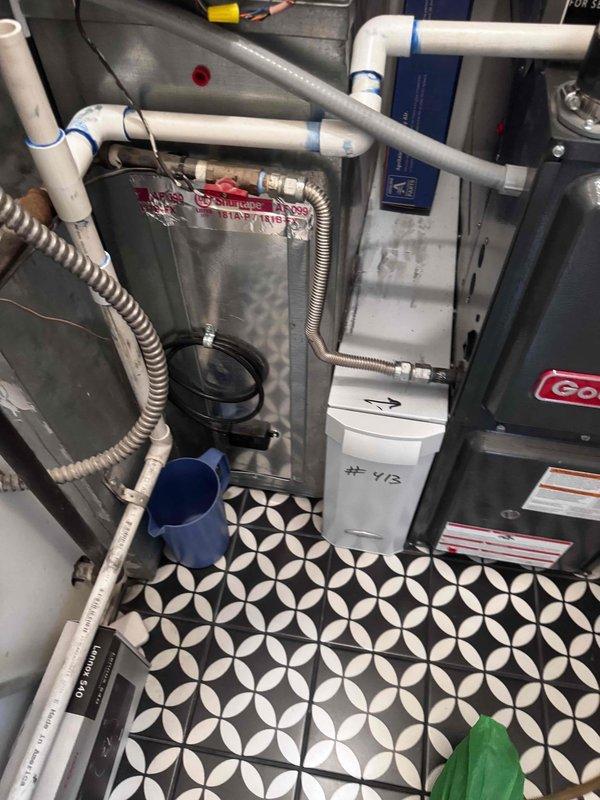 Completed preventive maintenance on two Goodman HVAC systems, both under 5 years old, located in basement mechanical room. Performed comprehensive cooling system inspection including filter check, refrigerant level verification, electrical connection inspection, condensate drain line evaluation, and thermostat calibration on both units. All systems operating within manufacturer specifications with no reported issues or deficiencies found during inspection.