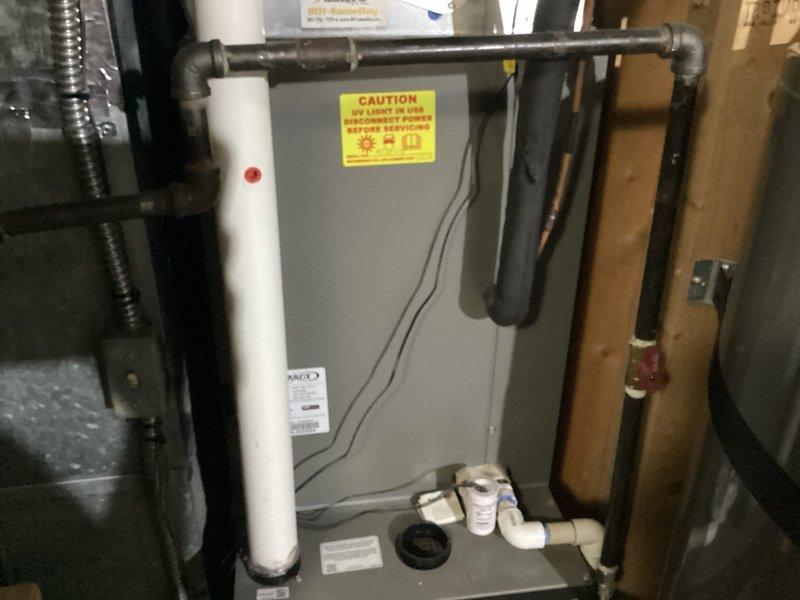 Completed Gold Cooling Maintenance on single-system residential HVAC installation. Performed comprehensive maintenance on Lennox furnace located in basement and outdoor AC unit in backyard, both with easy access. Inspected air handler cabinet, verified condensate drain lines and PVC venting connections, checked electrical connections and safety controls, cleaned components as needed, and confirmed proper system operation.