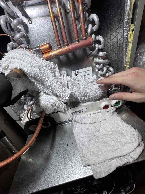 Returned to site to complete warranty replacement of evaporator coil on 2.5 ton system. Initial callback was due to system not starting and pressure test confirming no refrigerant in system. Replaced ADP evaporator coil (2.5 ton, 17.5"W) that was installed in 2023 and covered under warranty. Verified refrigerant line connections, performed leak check on new coil installation, and confirmed proper system operation. System tested and operational upon completion.