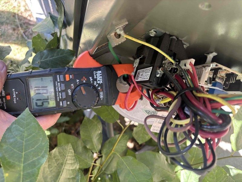 Completed comprehensive cooling maintenance on 2-year-old HVAC system including ground unit and basement furnace. Performed standard Green Shield maintenance protocol, inspected and verified clean air filter condition, tested electrical components and measured voltage readings on outdoor unit contactor and relay assembly. All system components operating within normal parameters with no issues identified during inspection.