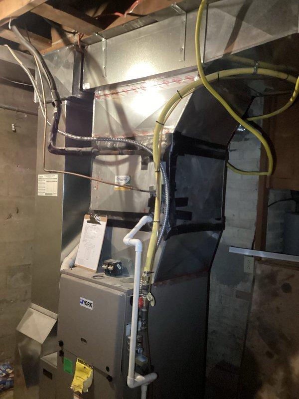 Responded to no cooling complaint on residential HVAC system. Inspected aging York furnace and air handler unit, both showing significant deterioration at 20-22 years of service life with extensive damage to multiple components. Evaluated both units for repair feasibility versus replacement options. Presented homeowner with comprehensive replacement recommendations and multiple system upgrade options due to age and condition of existing equipment making repairs cost-prohibitive.