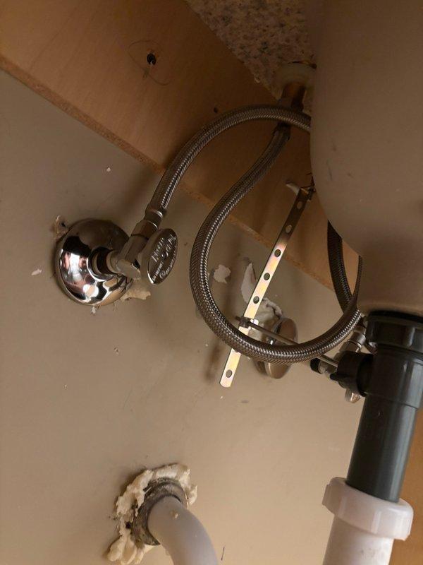 Completed comprehensive repipe installation in basement involving jackhammering concrete floor to access and replace kitchen and laundry drainage lines. Installed new 3-inch main drain line from sewer stack with dedicated 2-inch laundry branch transitioning to 3-inch, and re-piped kitchen drainage vertically to sink level with auto vent installation. Additionally installed 45-foot cure-in-place liner through main sewer line from vertical stack, including drywall removal for access, complete root removal, hydro-jetting, and descaling preparation. Restored all concrete flooring and completed new supply line connections with shut-off valves under sink fixtures.