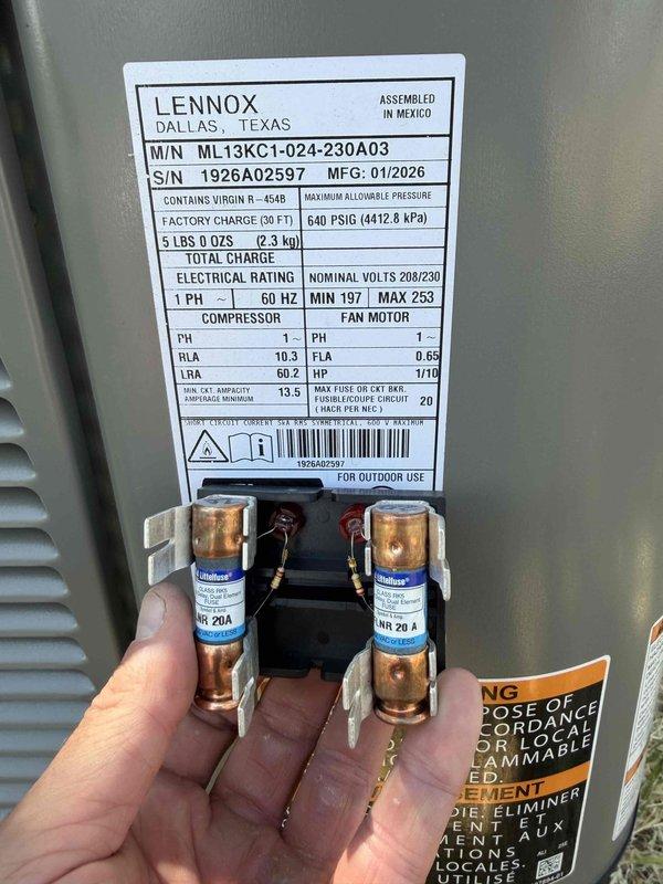 Completed full HVAC system replacement including installation of Lennox ML180UH070E36AK 80% efficiency furnace (70,000 BTU), ML13KC1-024 air conditioning condenser unit (2-ton), and CK40CT-24A-71 evaporator coil. Replaced inadequate flexible flue piping with proper double-wall venting system to meet code requirements and ensure safe furnace operation. Installed new AC pad, flushed and reused existing lineset, mounted outdoor disconnect with 20-amp fuses, installed T6 programmable thermostat, and added 16x25x1 filter rack with filters; system tested and operational.