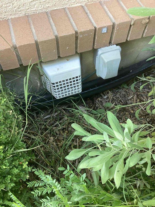 Responded to callback for incomplete installation work where foundation vent cover was missing from front-facing exterior location. Inspected installation site and confirmed proper white plastic vent cover was installed on foundation panel adjacent to existing ventilation components. Verified all exterior HVAC penetrations and vents now have appropriate covers in place and installation is complete per original work scope.