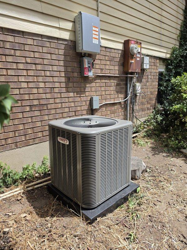 Completed full HVAC system replacement consisting of Lennox SL280UH070V36AK 80% efficiency furnace, ML13KC1-030 air conditioning condenser unit, and CK40CT-30A-71 evaporator coil. Removed existing equipment and installed new furnace with proper venting using double wall materials. Mounted new condenser unit on EL3030-3 composite pad against exterior brick wall with appropriate clearances. Installed electrical disconnect boxes and circuit protection on exterior wall with conduit runs connecting to condenser unit. Flushed and reused existing refrigerant lineset, ensuring proper connection to new equipment. Installed new 16x25x1 filter rack with four replacement filters for ongoing maintenance. Retained existing thermostat and verified proper communication with new system. Completed all necessary sheet metal fabrication for proper airflow integration. Protected work areas with drop cloths throughout installation process. Performed system startup, verified proper operation of all component