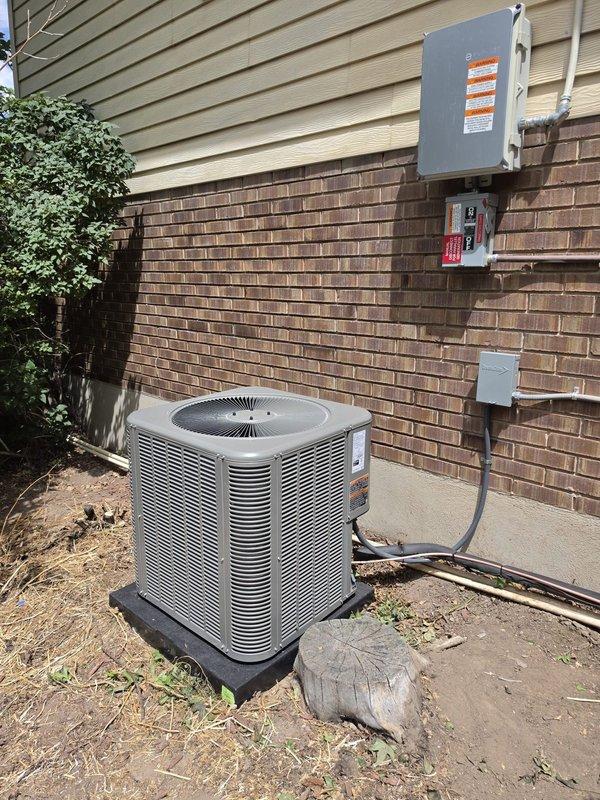 Completed full HVAC system replacement consisting of Lennox SL280UH070V36AK 80% efficiency furnace, ML13KC1-030 air conditioning condenser unit, and CK40CT-30A-71 evaporator coil. Removed existing equipment and installed new furnace with proper venting using double wall materials. Mounted new condenser unit on EL3030-3 composite pad against exterior brick wall with appropriate clearances. Installed electrical disconnect boxes and circuit protection on exterior wall with conduit runs connecting to condenser unit. Flushed and reused existing refrigerant lineset, ensuring proper connection to new equipment. Installed new 16x25x1 filter rack with four replacement filters for ongoing maintenance. Retained existing thermostat and verified proper communication with new system. Completed all necessary sheet metal fabrication for proper airflow integration. Protected work areas with drop cloths throughout installation process. Performed system startup, verified proper operation of all component