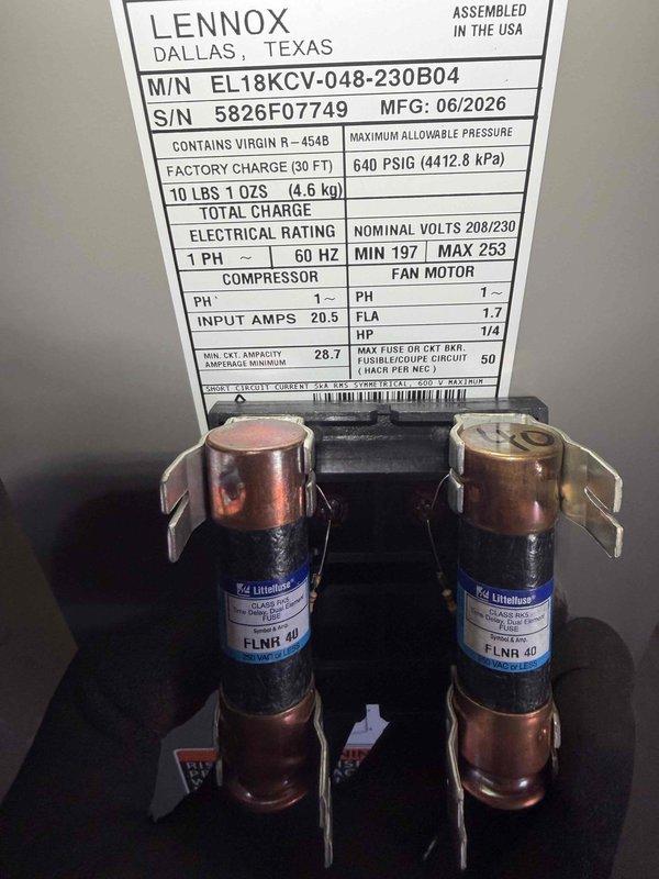 Completed installation of Lennox EL18KCV-048 air conditioning system with CK40CT-48C-71 evaporator coil and RDS communicating board 27A03. Flushed and reused existing lineset, installed unit on new EL3636-3 pad, and upgraded to Ecobee thermostat with remote room sensor for master bedroom placement. Installed 20x25x5 MERV 11 filter, verified all electrical connections including 40-amp fuses, routed thermostat wiring through walkout basement, and confirmed system operation with proper refrigerant charge and communication between components.