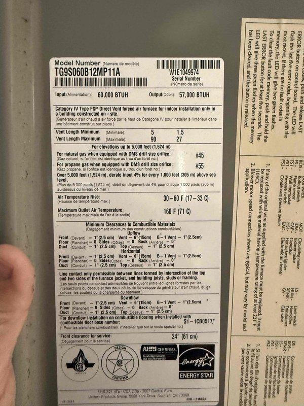 Responded to service call for non-operational HVAC system. Inspected TG9S060B12MP11A Category IV direct vent forced air furnace rated at 60,000 BTU input and 57,000 BTU output. Documented unit specifications including serial number W1E1049974 and verified manufacturer label information. Examined control board assembly and electrical connections, noting multiple wire terminations at circuit board terminal blocks including power supply, thermostat control wiring, and safety circuit connections. Photographed PCB components and wiring configuration for diagnostic purposes. System evaluation completed with visual inspection of all accessible electrical components and connections to determine cause of malfunction.