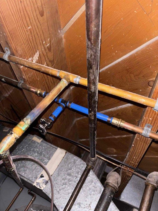 Responded to reported leak from humidifier saddle valve connection. Upon inspection, found the saddle tap valve on the water supply line feeding the furnace humidifier was stripped and actively leaking. Removed the defective saddle valve assembly from the water line. Properly capped and sealed the penetration point in the copper water line to eliminate the leak source. Verified repair integrity and confirmed no active leaks present upon completion.