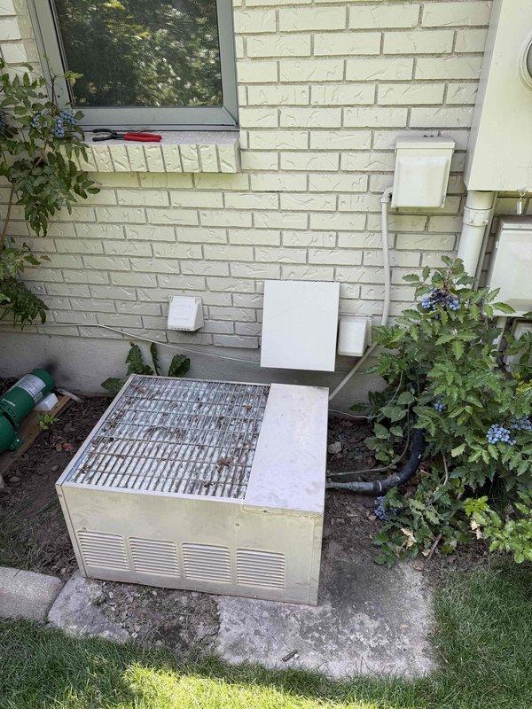 Responded to no cooling complaint on right-side residential AC unit. Performed comprehensive system inspection including condenser examination, refrigerant level assessment, and airflow evaluation. Accessed condenser coil compartment to inspect internal components and verify system operation per manufacturer specifications.