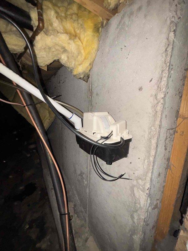 Completed full HVAC system installation including 5TTR3030A1000A air conditioning unit with 5MXCC009AC6HCA evaporator coil on new EL3636-3 equipment pad. Uninstalled and reinstalled existing furnace to accommodate new system configuration. Installed 50 feet of new 3/8" x 3/4" copper lineset per customer request, replacing old refrigerant lines. Installed condensate pump for proper drainage management. Upgraded thermostat to T6 Pro programmable unit with new wiring connections. Performed complete system startup and conducted leak test verification using digital manifold gauges, achieving passing results at 509.2 psig with only 0.3% pressure drop over 15-minute test period, well within acceptable 2.0% threshold. All electrical connections secured in junction boxes with proper cable routing through basement utility area. Protected work areas with drop cloths throughout installation process. System tested and operating within manufacturer specifications.