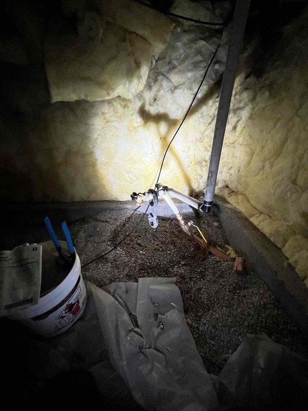 Responded to no water condition affecting entire residence. Accessed attic crawl space and located water pressure system with failed pressure gauge reading. Inspected pressure tank assembly, valve configuration, and associated piping. Diagnosed complete loss of water pressure due to system malfunction, requiring pressure system component replacement to restore full water service to the home.