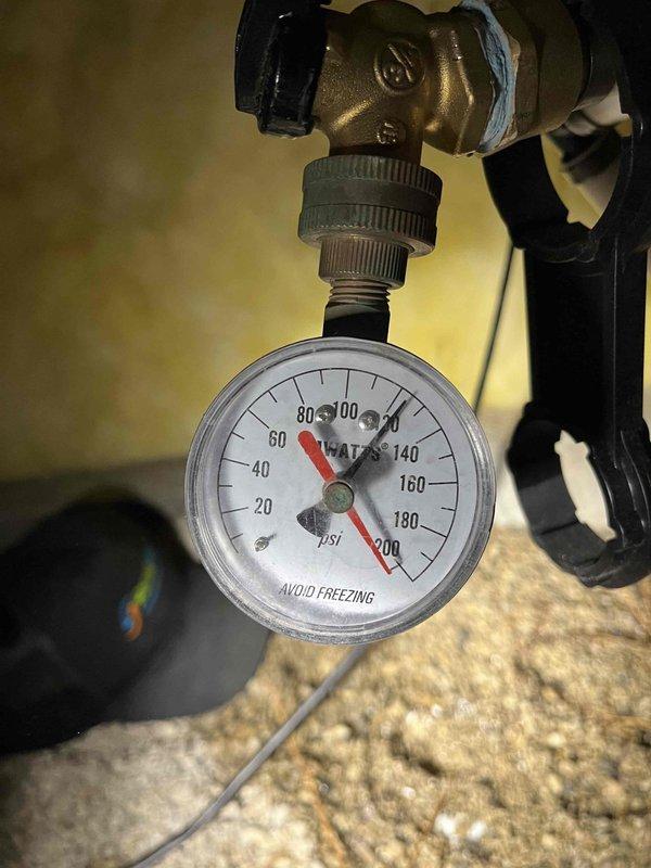 Responded to no water condition affecting entire residence. Accessed attic crawl space and located water pressure system with failed pressure gauge reading. Inspected pressure tank assembly, valve configuration, and associated piping. Diagnosed complete loss of water pressure due to system malfunction, requiring pressure system component replacement to restore full water service to the home.