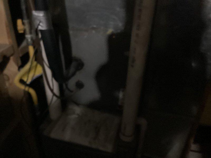 Responded to no cooling complaint on 11-year-old residential split system with condenser located on west side of home and furnace in basement. Upon arrival, verified system was running but unable to maintain temperature below 86 degrees. Performed comprehensive Cool 10+ point inspection including visual examination of indoor and outdoor equipment, verified airflow at registers, checked thermostat operation and settings, inspected condensate drain system for blockages, examined electrical connections and components, and assessed overall system performance. Documented equipment model and serial number information from manufacturer data plate on furnace. Evaluated condenser unit operation including fan motor function and compressor performance. Inspected evaporator coil accessibility and condition in basement installation. Provided findings and recommendations to address cooling deficiency.
