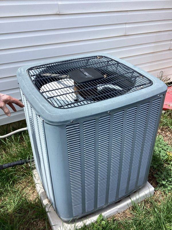 Responded to customer complaint of lukewarm air from vents and rising indoor temperatures on a 2017 single-zone residential cooling system with ground-level outdoor condenser unit. Performed comprehensive Cool 5-9 diagnostic service on the air conditioning system. Inspected outdoor condenser unit for proper operation, verified compressor function, and checked refrigerant pressures. Accessed electrical control panel and inspected CoreSense Diagnostics module, capacitor connections, and associated wiring harnesses. Evaluated system performance and identified cooling deficiency requiring further attention to restore proper temperature control.