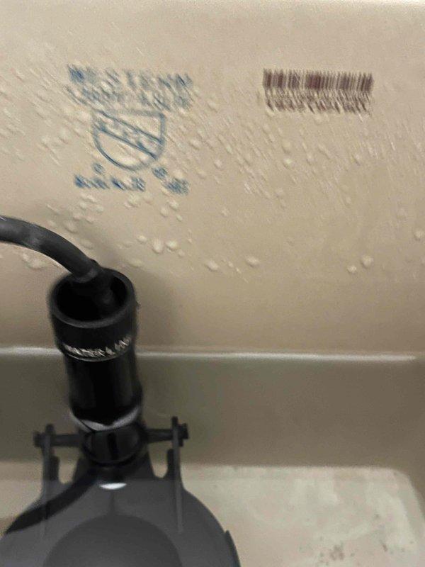 Responded to complete loss of water pressure affecting all fixtures throughout a 3-4 year old rental townhouse with 2.5 bathrooms. Conducted systematic diagnostic inspection of the plumbing system, including water main supply line, pressure regulator, and distribution piping. Documented water supply infrastructure components with photographic evidence showing pressure regulator assembly and related plumbing fixtures mounted in the service area.