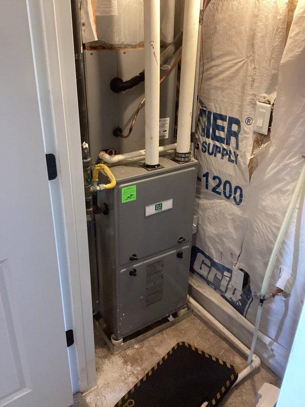 Responded to service call for 9-year-old air conditioning system experiencing intermittent freezing issues. Upon arrival, located HVAC equipment in utility closet and performed diagnostic evaluation of single AC unit and furnace system. Conducted temperature differential measurements using calibrated digital thermometer, documenting abnormal readings indicative of evaporator coil freezing condition. Inspected air handler, verified airflow restrictions, and assessed refrigerant charge levels. Identified root cause of freeze-over condition and provided recommendations for corrective action to restore proper system operation and prevent recurring freezing cycles.