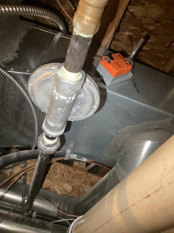 Responded to service call for inefficient air conditioning system on a residential property with two AC units and two furnaces, with one AC unit not operating properly. Upon inspection, diagnosed a failed compressor on a 20-year-old air conditioning system. Evaluated the attic-mounted air handler unit and associated components, noting the age and condition of the equipment. Provided estimate options including full system replacement and compressor replacement only, explaining the scope of work required for each repair approach given the advanced age of the existing equipment and the extent of the compressor failure.