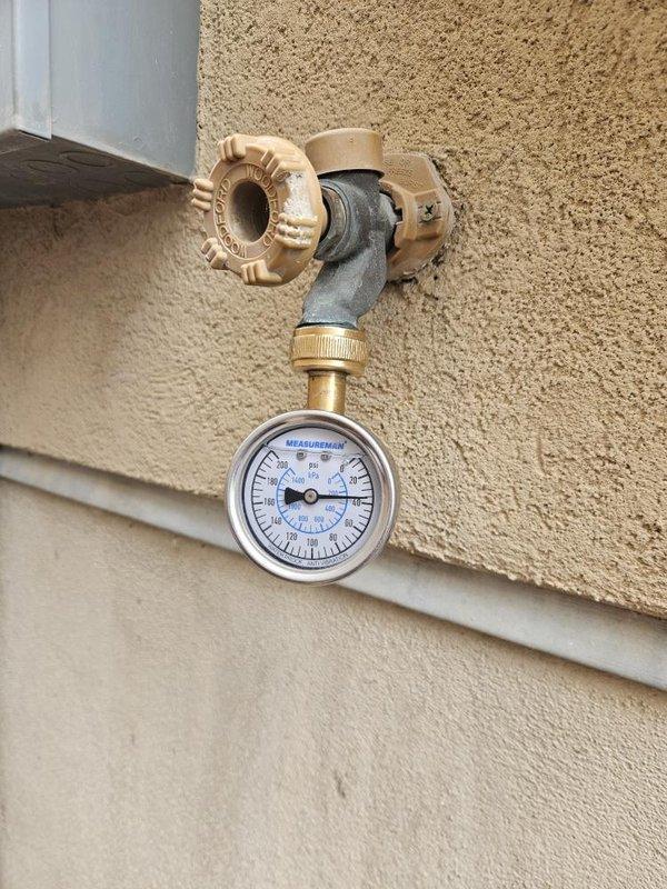 Completed estimate for standard 40-gallon tank water heater replacement at residential property. Inspection revealed existing unit with significant corrosion and rust damage to metal components, water heater base, and surrounding floor area, indicating active water leakage and advanced deterioration. Exterior plumbing assessment included evaluation of hose bib and water pressure testing capability. Provided comprehensive replacement estimate including removal of failed water heater, proper disposal, installation of new 40-gallon residential tank water heater with code-compliant connections, and necessary permit coordination.