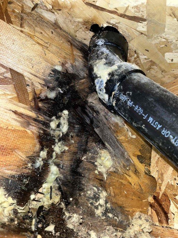 Responded to service call for 4-month-old Rheem Professional tanked water heater with flashing indicator light. Performed diagnostic inspection of unit installed in basement with proper seismic strapping and venting. Verified all operational parameters including gas supply, burner operation, temperature and pressure relief valve function, and flue venting system. Inspected electrical connections and control board status. Confirmed water heater operating within normal specifications with no fault conditions present. Advised that intermittent indicator light flash pattern is normal operational status display and does not indicate malfunction. Unit remains under manufacturer warranty with all components functioning properly.