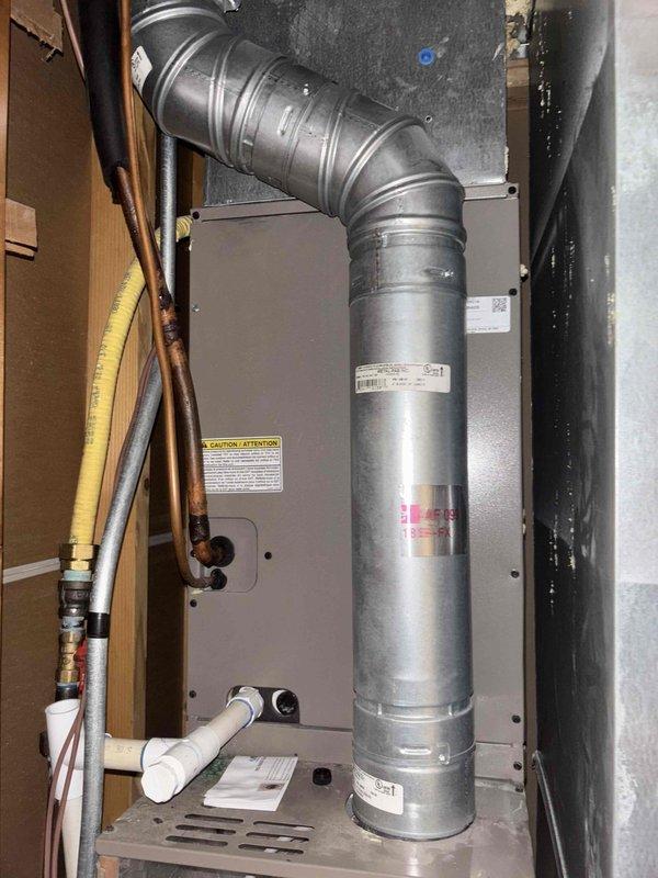 Completed annual Green Shield cooling maintenance on two 11-year-old air conditioning systems serving a multi-level residential property. Performed comprehensive tune-up and inspection on both outdoor condenser units located in side yard on gravel pad, and indoor air handler units positioned in upstairs closet and basement utility space. Inspected refrigerant lines, condensate drain systems, electrical connections, and ductwork on both systems. Verified proper operation of all components including fan motors, compressors, and controls. Both units operating within normal parameters with no reported issues or deficiencies noted during inspection.