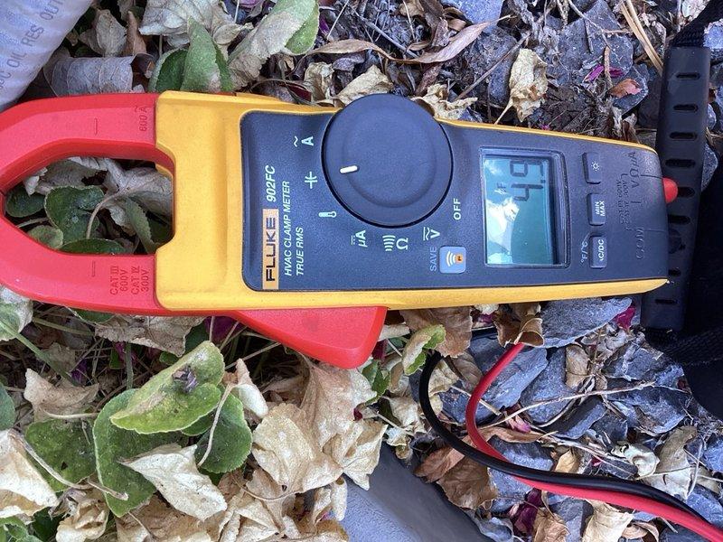Completed membership maintenance visit which included replacing thermostat batteries per customer request. Performed electrical diagnostics on HVAC system using clamp meter, recording amperage draw of 53 amps on outdoor unit. Inspected condensate drainage system and documented corrosion and mineral buildup on copper piping components requiring future attention.