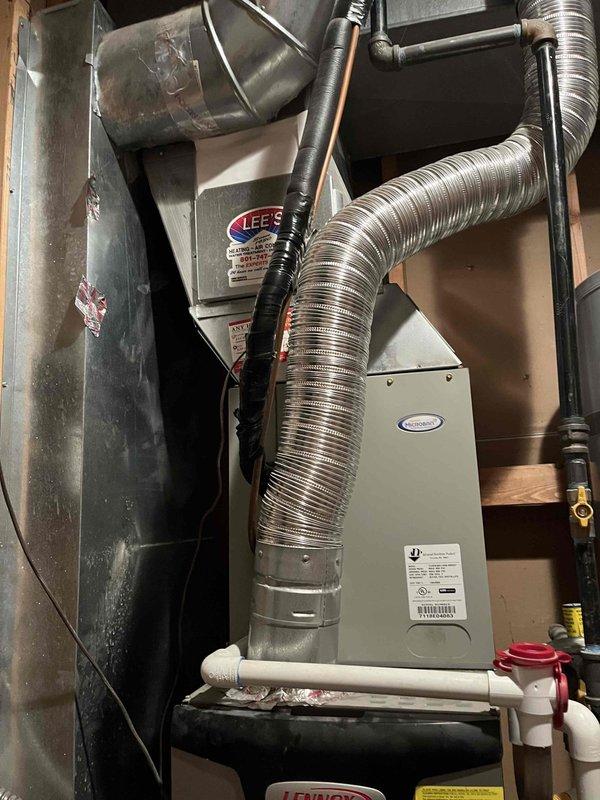 Completed evaporator coil replacement on 7-year-old Lennox HVAC system experiencing total loss of cooling. Unit was previously diagnosed with failed evaporator requiring full coil replacement to restore system operation and refrigerant integrity.