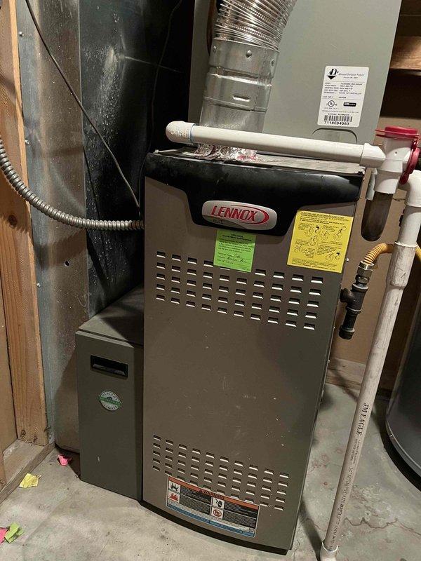 Completed evaporator coil replacement on 7-year-old Lennox HVAC system experiencing total loss of cooling. Unit was previously diagnosed with failed evaporator requiring full coil replacement to restore system operation and refrigerant integrity.