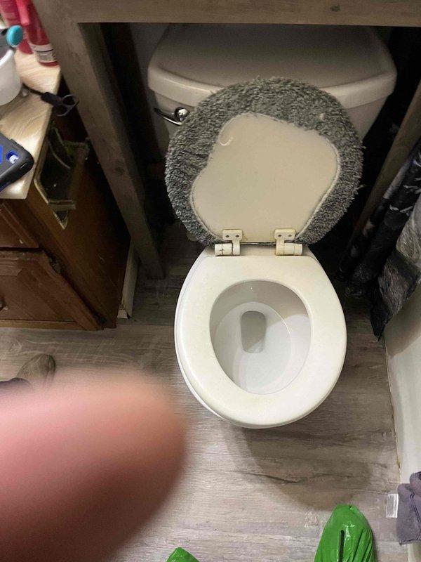 Responded to active drainage backup in bathroom with water backing up through sink, toilet draining improperly, and tub not draining. Cleared main line obstruction using cable machine, restoring proper drainage to all fixtures. Verified all bathroom fixtures draining properly upon completion.