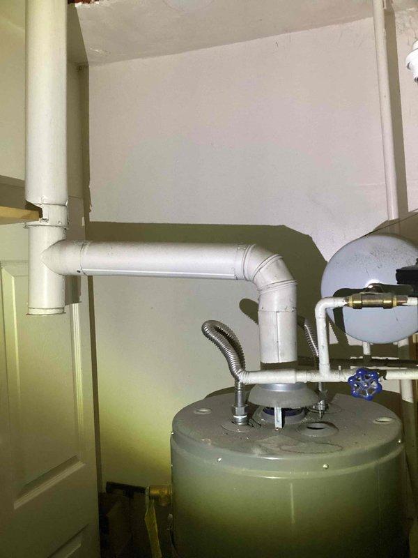 Responded to service call for tanked water heater with pilot light failure after unit had been vacant for one month. Accessed unit in basement utility room and performed diagnostic inspection of gas supply, thermocouple, and pilot assembly. Verified gas supply at exterior meter bank and confirmed proper flow to appliance. Successfully relit pilot light and tested burner ignition sequence to ensure proper operation and hot water restoration.