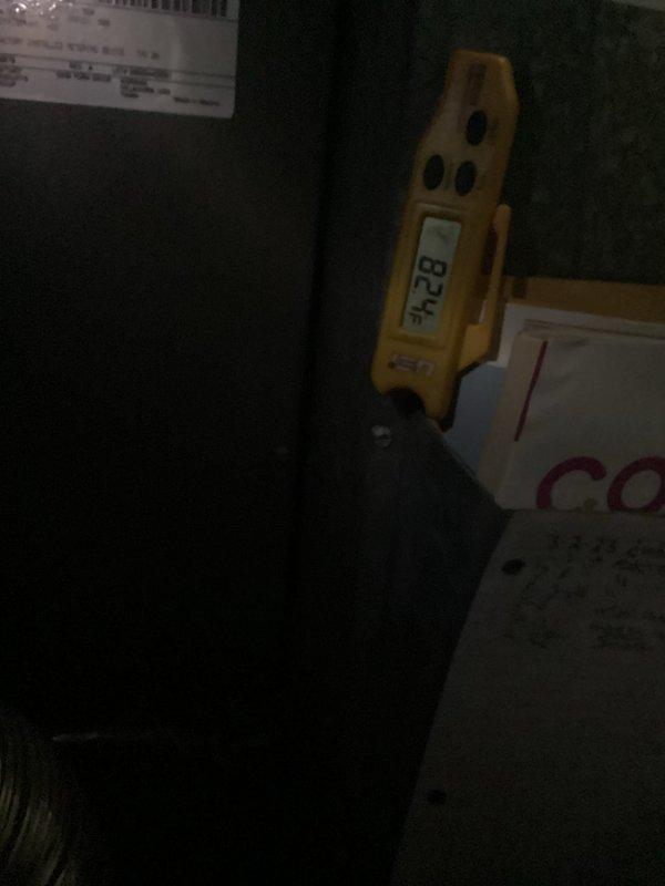 Responded to no cooling complaint and performed diagnostic evaluation of residential HVAC system. Conducted temperature measurements at supply ductwork using digital instrumentation, recording readings of 82°F which indicated inadequate cooling performance. Assessed downstairs furnace and outdoor condensing unit, documenting system conditions through photographic evidence for further analysis and repair recommendations.