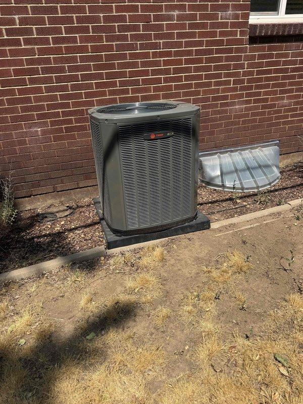 Responded to service call for 4-year-old Trane air conditioning unit experiencing intermittent rattling noises. Removed fan assembly and cleaned out accumulated leaves and debris from condenser unit as requested. Inspected fan blade for contact with housing and verified proper clearance after cleaning and reassembly.