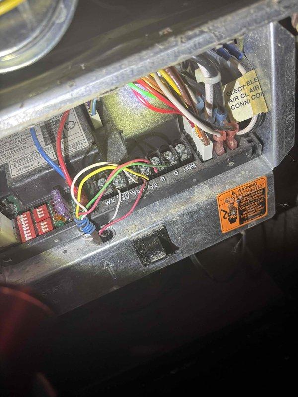 Responded to service call for 25-year-old residential air conditioning system experiencing inadequate cooling and squeaking noise from outdoor unit. Performed comprehensive Cool 10+ diagnostic inspection including visual assessment of outdoor condensing unit, electrical control panel examination, and refrigerant pressure testing using dual-port manometer. Inspected electrical connections, terminal blocks, control board components, and low-voltage wiring within control panel. Identified significant dust accumulation throughout electrical compartment and verified all wire connections at terminal strips. Measured system pressures and evaluated compressor operation. Due to advanced age of equipment (20+ years), recommended system replacement options to ensure reliable cooling performance and improved energy efficiency. Provided customer with complete findings and replacement recommendations.