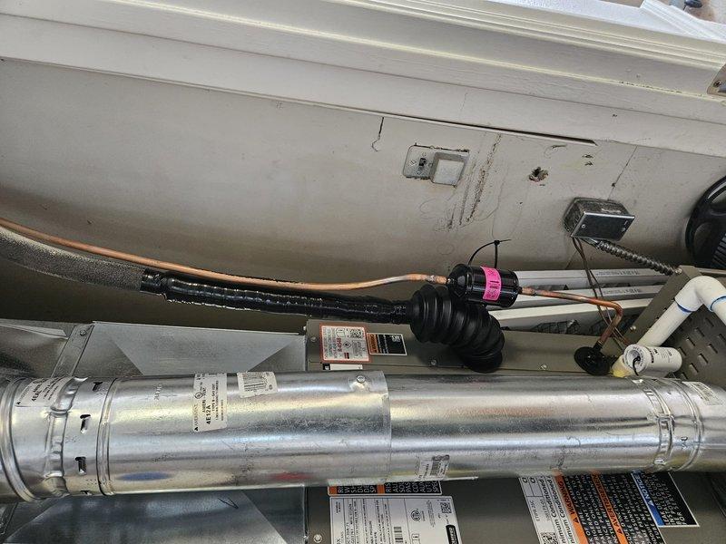 Completed full 80% AFUE HVAC system replacement including installation of Lennox ML180UH070E36AK furnace, ML13KC1-024 air conditioner, and CK40CT-30A-71 evaporator coil. Flushed and reused existing lineset, installed new AC pad (EL3030-3), mounted exterior electrical disconnect with proper interlock, and completed all necessary ductwork connections and sheet metal fabrication. Installed T6 Pro programmable thermostat, 16x25x1 filter rack with filters, verified all electrical connections, tested system operation, and confirmed proper refrigerant charge and airflow throughout the system.