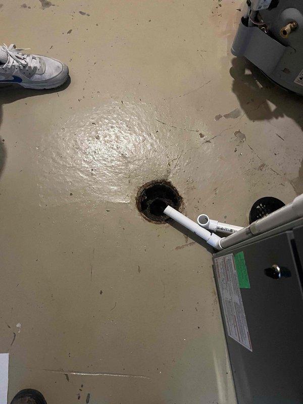 Responded to sewer line blockage affecting basement fixtures with discharge backing up into toilet and bathtub, particularly when washing machine was in use. Located and cleared obstruction in main sewer line between lowest drain point and cleanout access within the 20-foot section of original 1991 piping. Successfully restored proper drainage flow to all affected fixtures, eliminating backup conditions throughout basement plumbing system.