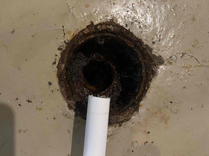 Responded to sewer line blockage affecting basement fixtures with discharge backing up into toilet and bathtub, particularly when washing machine was in use. Located and cleared obstruction in main sewer line between lowest drain point and cleanout access within the 20-foot section of original 1991 piping. Successfully restored proper drainage flow to all affected fixtures, eliminating backup conditions throughout basement plumbing system.