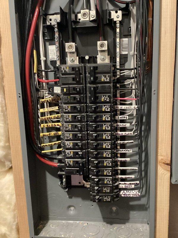 Completed comprehensive electrical safety inspection as part of recurring membership maintenance visit. Performed thorough examination of main electrical service panel, verifying proper operation of all circuit breakers, inspecting bus bar connections and main lugs for signs of overheating or corrosion, and confirming appropriate wire routing and bundling throughout the panel. Documented panel configuration with detailed photographs showing breaker arrangement, circuit labeling for entry, range, air conditioning units, disposal, and attic lighting circuits, and overall system condition. No deficiencies, safety hazards, or electrical issues identified during inspection. All components found to be functioning properly with adequate wire management and secure connections.