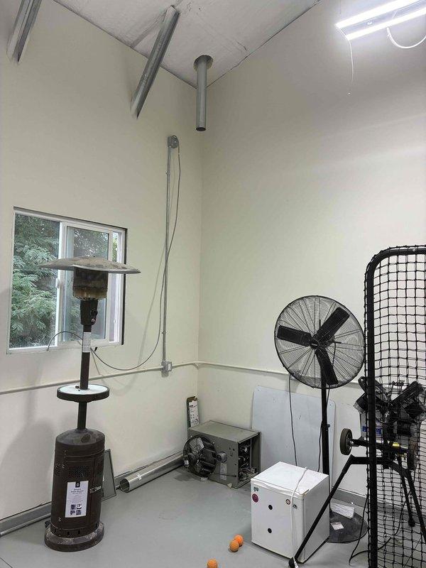 Completed installation of new shop heater unit in mechanical room. Mounted heater to wall using secure bracket system and completed all electrical wiring connections to power the unit. Flue and venting system were previously installed and verified for proper integration with new heater. Due to weight of equipment, utilized lifting assistance to safely position and secure the unit. All electrical connections tested and verified operational upon completion.
