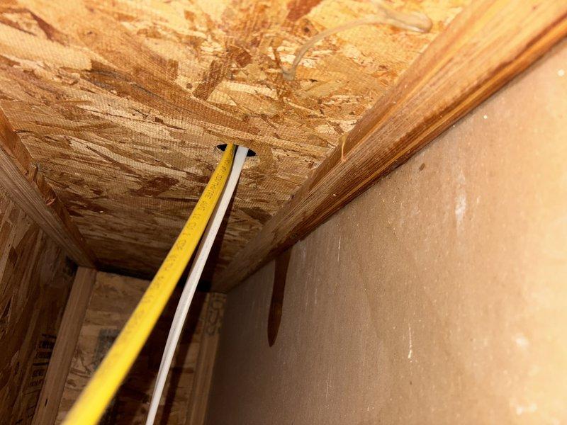 Responded to a recurring water leak manifesting through a ceiling-mounted light fixture in the living room, causing bulging, water damage, and flooding to the lower level. Performed authorized diagnostic investigation by opening ceiling access to expose plumbing lines and subfloor above the affected area. Conducted comprehensive inspection of all accessible water supply lines, drain lines, and fixture connections in the vicinity of the leak point. Systematically tested multiple plumbing fixtures by running water through each to attempt recreation of the leak condition while monitoring for active water intrusion. Inspected surrounding areas for moisture, staining, or other indicators of water source. Despite thorough investigation, unable to identify definitive leak source during service visit. Documented findings and communicated diagnostic limitations to homeowner. Advised customer to monitor for future occurrences and note any correlation with specific water usage, weather events, or