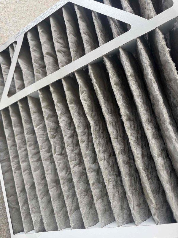 Completed routine cooling maintenance on a 4-year-old residential HVAC system with one air conditioning unit and one air handler. Inspected and replaced heavily soiled air filter showing significant dust and debris accumulation. Performed temperature differential measurements across the system, recording supply air temperature readings to verify proper cooling operation. Conducted comprehensive system inspection of outdoor condensing unit and indoor air handler located in basement, confirming all components operating within normal parameters with no reported issues.