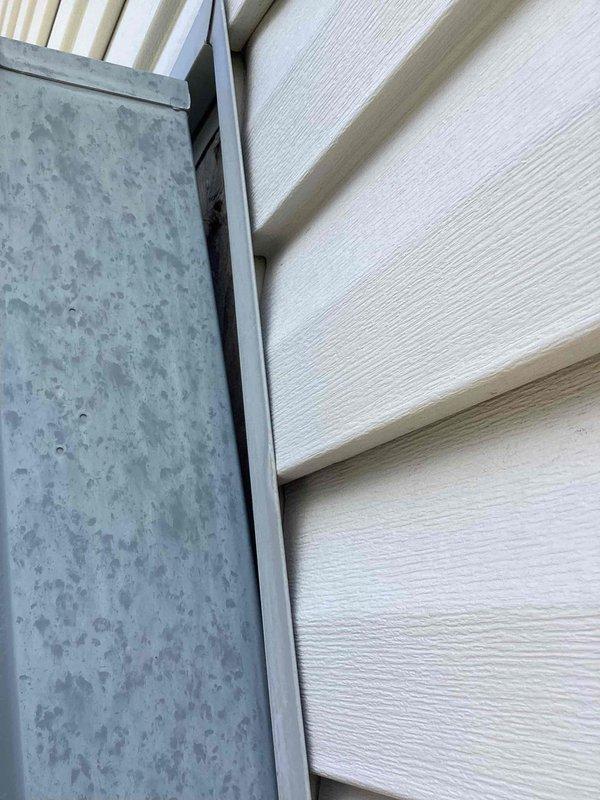 Responded to recurring issue with exterior breaker panel repeatedly detaching from building structure despite previous strapping attempts. Inspected panel mounting system and underlying stucco wall substrate for structural integrity and proper fastener placement. Reinforced panel enclosure with upgraded mounting hardware and additional securing methods to prevent future separation from exterior wall surface.