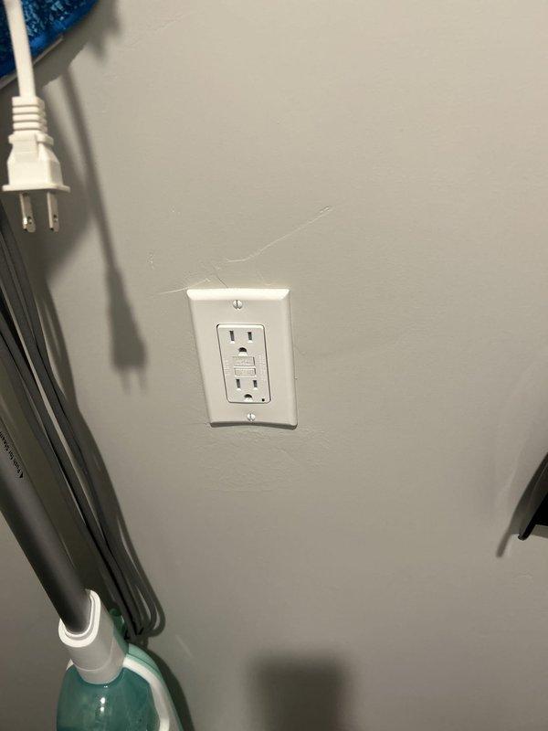 Completed routine electrical maintenance inspection for Green Shield member at residential property. Verified operation and functionality of smoke detector mounted on ceiling, confirming proper installation and indicator light operation. Inspected and tested GFCI outlet with reset/test button functionality, verified proper grounding and protection. Examined electrical conduit routing and connections, ensuring secure mounting and proper termination at junction points. All components found to be functioning within normal parameters with no immediate safety concerns identified.