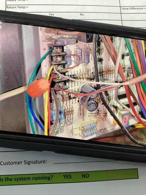 Responded to no-cooling call on 2-3 year old residential AC system. Upon arrival, verified unit would not start and thermostat was functioning properly. Inspected outdoor condensing unit in backyard and indoor air handler/furnace in basement. Examined electrical control board and found failed contactor preventing compressor from engaging. Replaced defective contactor, verified proper voltage and amperage at all connections, and tested system operation. Unit now cooling properly with normal temperature differential across evaporator coil.